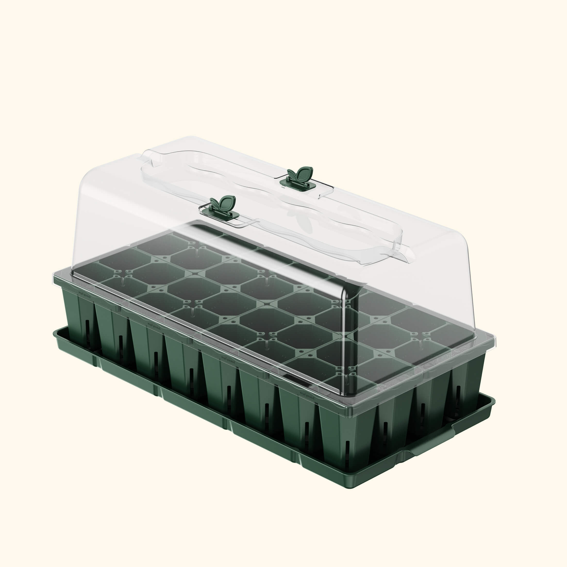 Green and clear seedling tray with lid on a white background